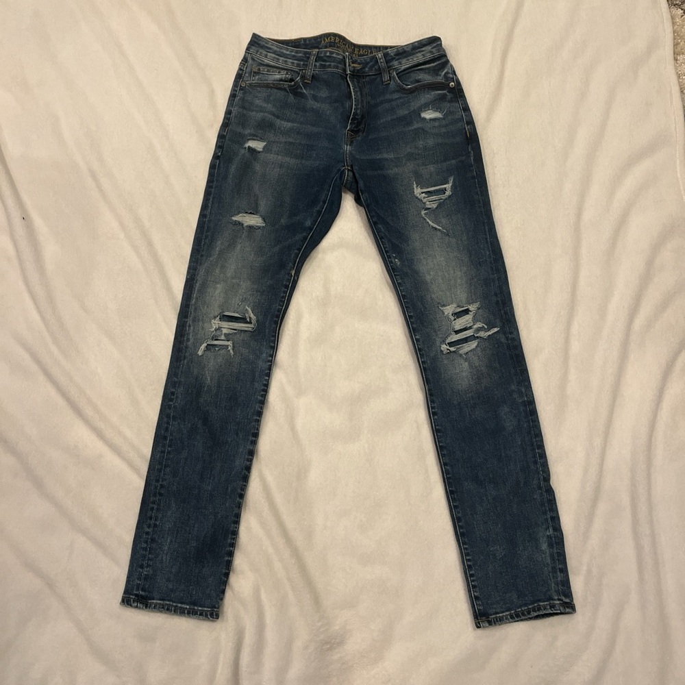 Distressed Blue Denim Jeans
